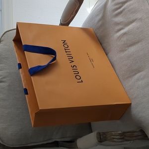 Louis Vuitton shopping bag and ribbons